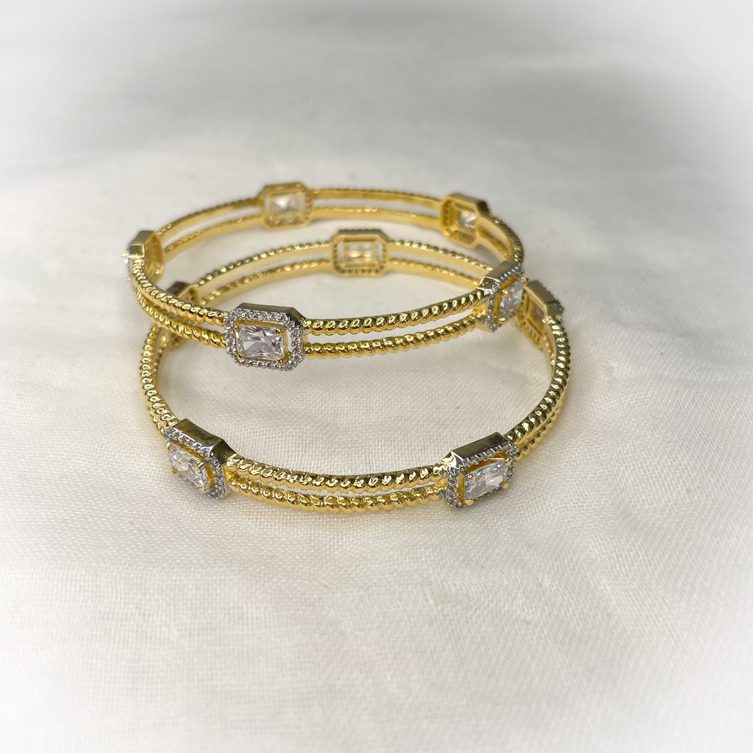 Golden solitaire bangles